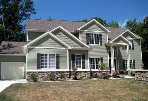 sage green house with brown metal roof|sage green house white trim.